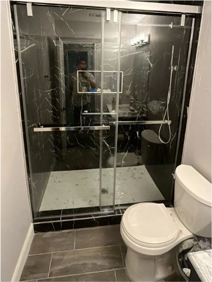 Black tile shower remodel