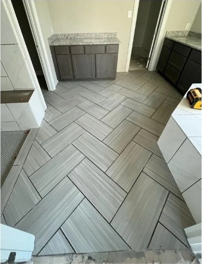 Gray tile flooring installation